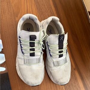 On Running White Sneakers with Black and Purple Details